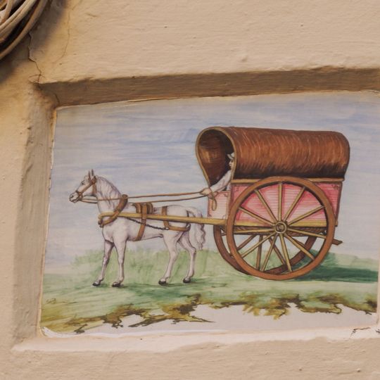 Ceramic panel of a Tartane at 18 Norberto Piñango street