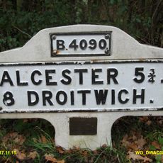 Milestone, alcester road, by entrance to National Grid electricity station