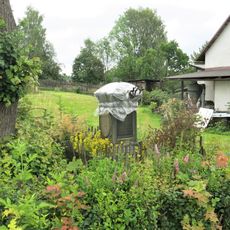 Kříž u domu Šluknovská 218/34 v Dolních Křečanech