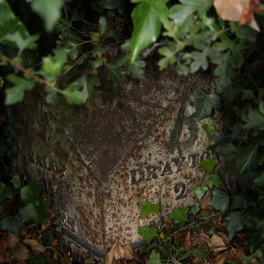 Milepost approximately 25 metres to south west of Fordhill Cottages