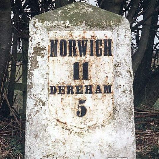 Milestone, E side of entrance to Poppy's Wood car park
