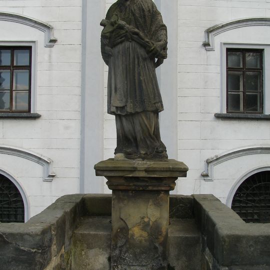 Statue of John of Nepomuk on the stone bridge in Brandýs nad Labem