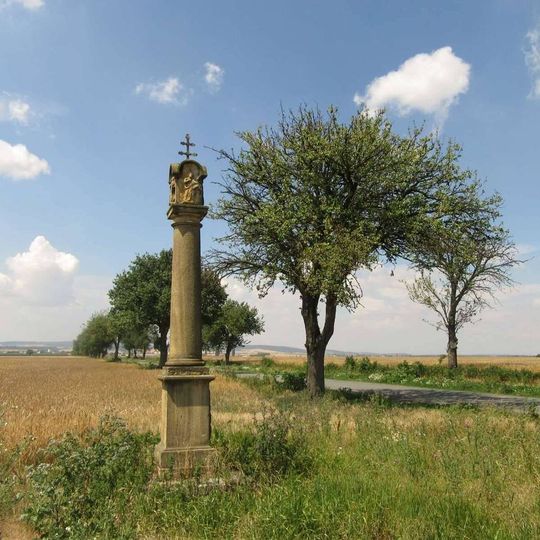 Boží muka s reliéfem svatého Isidora
