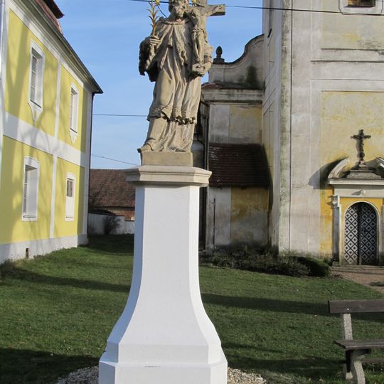 Statue of Saint John of Nepomuk in front of church