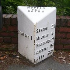 Milepost, Stafford, NE of town centre