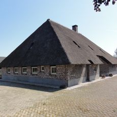 Vlaamse schuur op rechthoekige plattegrond en gedekt met een hoog schilddak