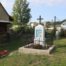 Kříž u domu 21 v Muckově