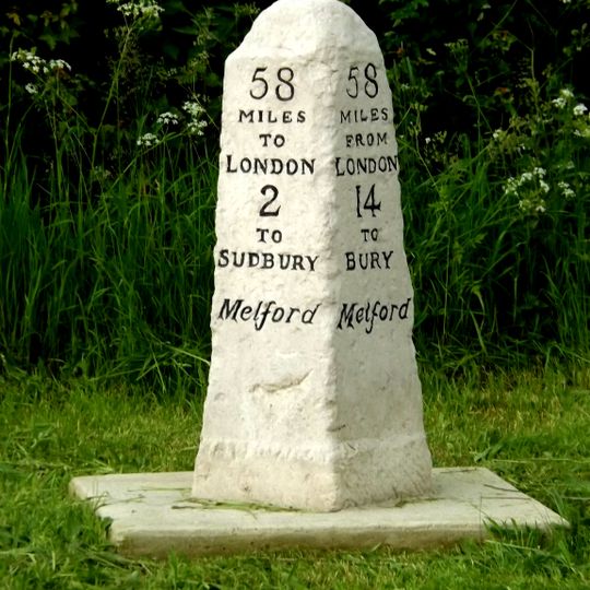 Milestone, Rodbridge Corner, N of jct and bus shelter