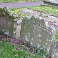 Group of three headstones approximately 3 metres south-west of south porch of Church Of St Giles