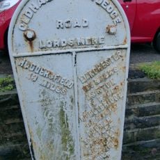 Milestone, ExYW Dobcross, nr Navigation Inn and canal bridge