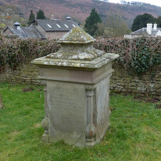 Gritton Monument approximately 30 metres south-west of west tower of Church of St Giles