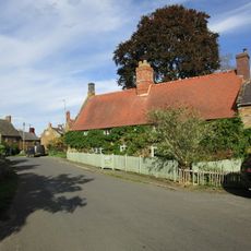 House Abutting And To Left Of Wisteria Cottage