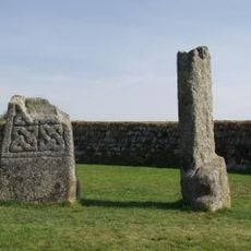 The Doniert Stone, accompanying cross shaft and underground chamber 650m SW of Common Moor