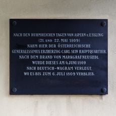 Plaque on the façade of the rectory of Markgrafneusiedl