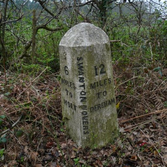 Milestone, 20yds S of turning to Swanton Novers