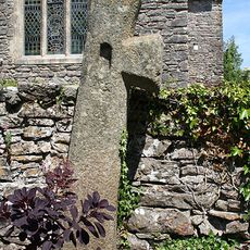 Church of St Bartholmew Cross Against South Wall in Churchyard