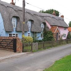 Thatched Cottage Between Brick House And Railway Bridge