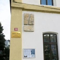 Pamětní deska obětem holokaustu na domě S.K.Neumanna 88 v Kralupech nad Vltavou