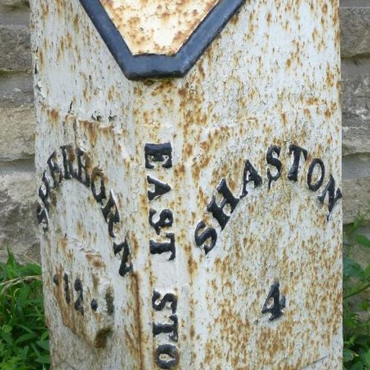Milepost, half mile E of East Stour; opp.  house called Northwood.