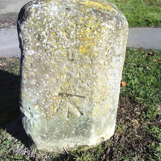 Milestone, Buckingham Road; by No. 215, in Manor Park, S of by-pass roundabout
