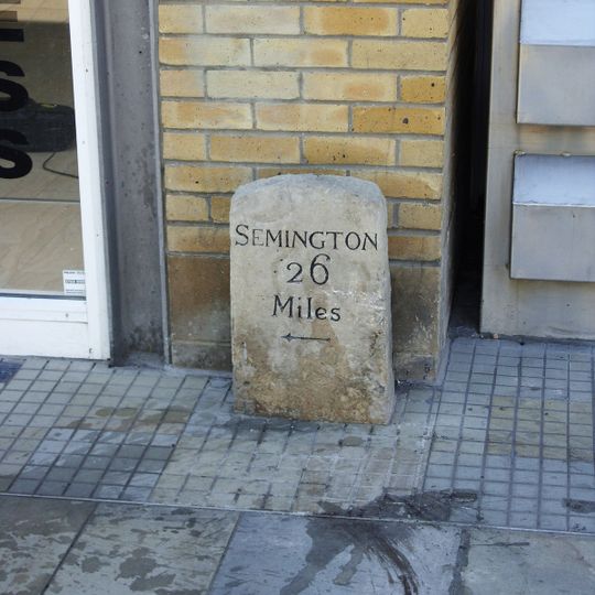Milestone Standing Outside Shop No 2-6