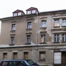 Wohnhaus in geschlossener Bebauung, Eckhaus, mit Laden mit originaler Front Langenstraße 22