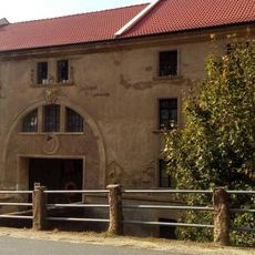 Pamětní deska na budově mlýna v Olovnici