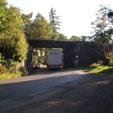 Železniční most přes Smečenskou ulici ve Slaném