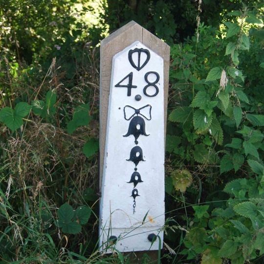 Milepost, London Road, jct with Susan's Close, near to Crockstead Hotel & Showground