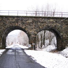 Železniční most přes silnici III/0225 a Andělici v Dobříkově