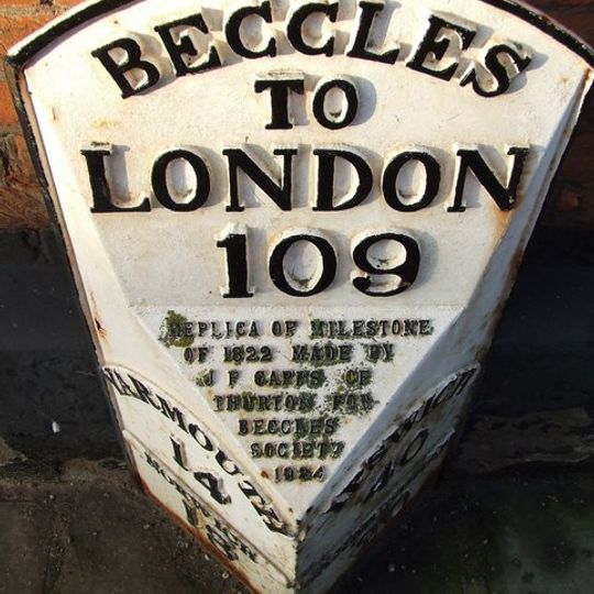 Milepost, by the Townhall, opp. Church