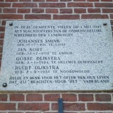 Plaquette aan het voormalige stadhuis