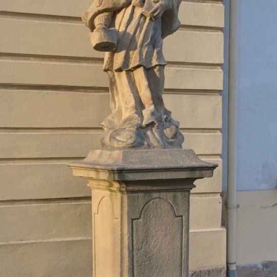 Statue of John of Nepomuk nearby the church in Kunín