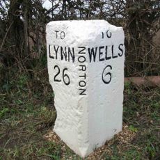 Milestone, 90yds E of jct with road to Burnham Norton