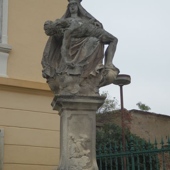 Statue of Pietà in front of the church in Šatov
