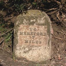 Milestone, Bodenham Moor; 25m S old mill in front of The Nook