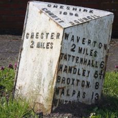 Milepost, almost under A55 bridge, by car showroom
