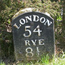 Milestone, Station Road; opp. jcn Monks Way
