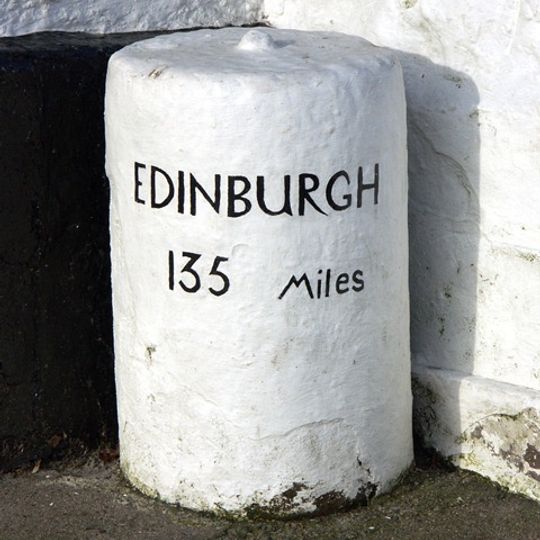 Milestones Flanking Steps To Entrance Of Number 128