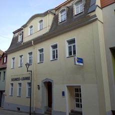 Wohnhaus in geschlossener Bebauung und zwei Hintergebäude Baderberg 6