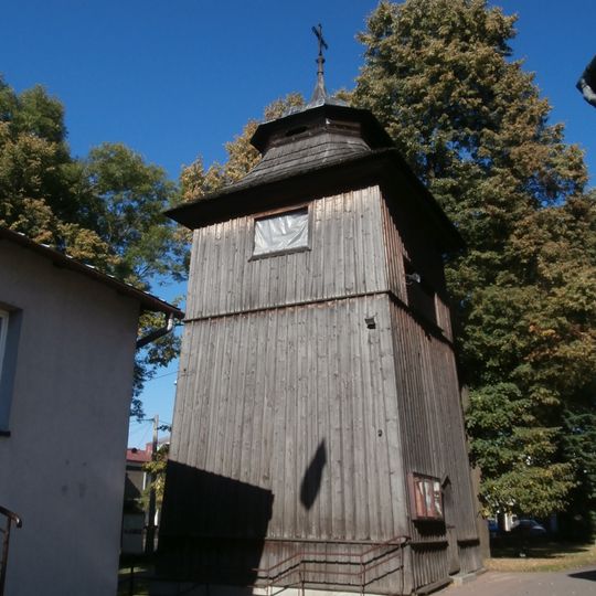 Wooden bell tower of Saint Nicholas church in Skała