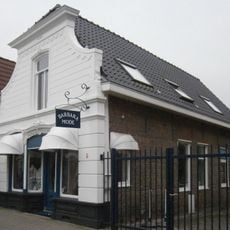 Winkelpand voorgevel met winkelpui