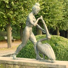 Female teenager with pelican