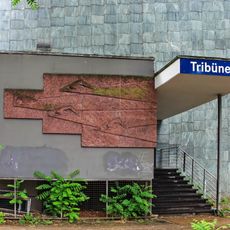 Wettschwimmen, Steinrelief