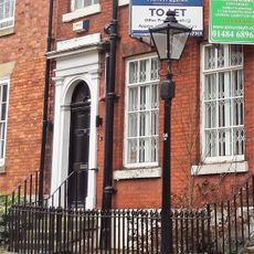 Gas Lamp Post On Pavement Between Numbers 16 And 17