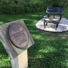 Pomník Johanna Caspara Ferdinanda Fischera u kláštera v Ostrově nad Ohří