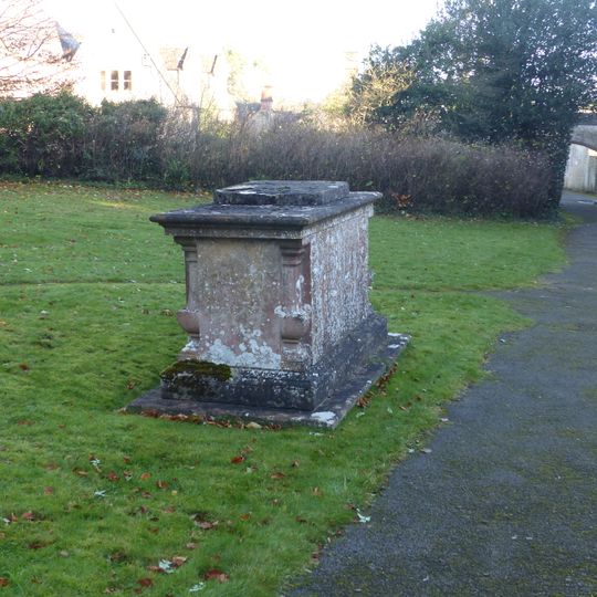 John Smith monument in the churchyard approximately 10 metres south east of chancel to Church of St John the Baptist