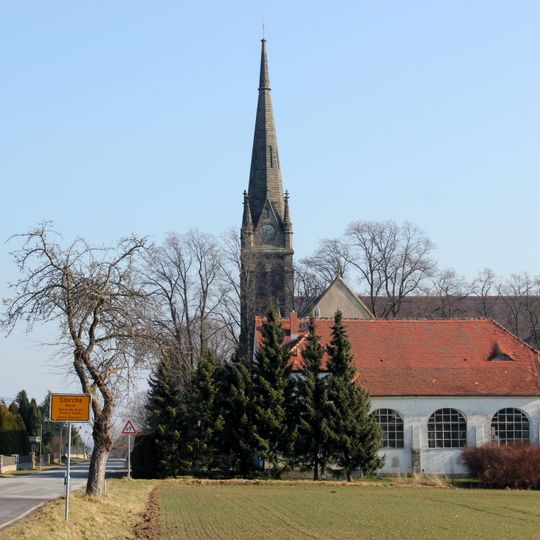 Villenartiger Verwaltungsbau mit rückwärtig angebauter Turnhalle Storcha 16