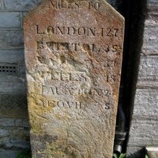 Milestone Against South West Corner Of The Town Hall
