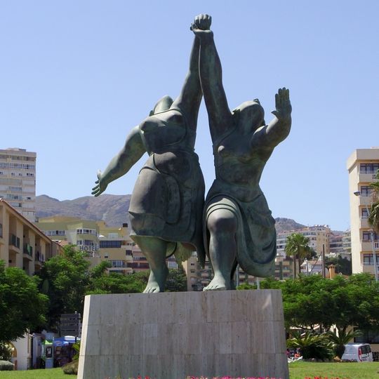 Mujeres corriendo por la playa